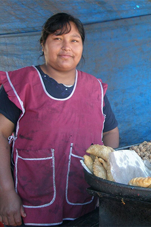 Woman provided access to healthcare and business loans from Pro Mujer and Deetken Impact investments.